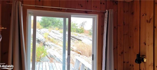 View to North deck from Bedroom 2 | Image 6