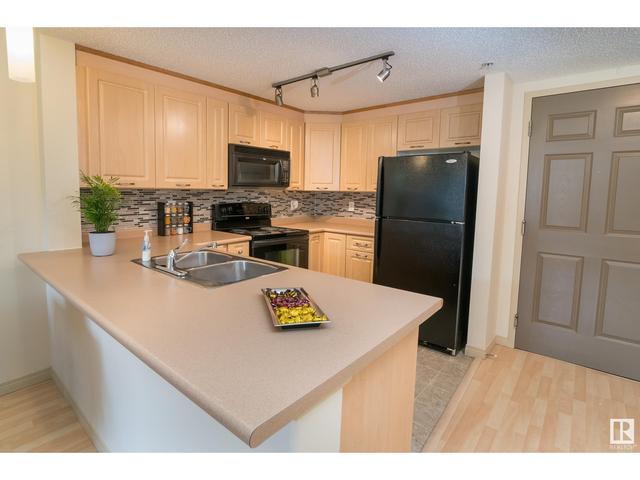 225 - 6315 135 Av Nw, Condo with 2 bedrooms, 2 bathrooms and 1 parking in Edmonton AB | Image 18