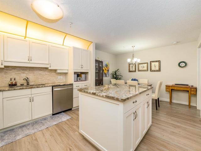 124 - 7229 Sierra Morena Boulevard Sw, Condo with 2 bedrooms, 2 bathrooms and 1 parking in Calgary AB | Image 8