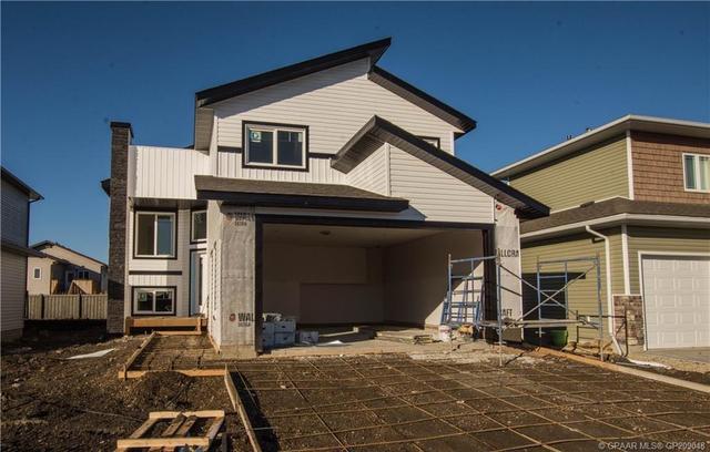 9091 80 Avenue, House detached with 3 bedrooms, 2 bathrooms and 4 parking in Grande Prairie AB | Image 1