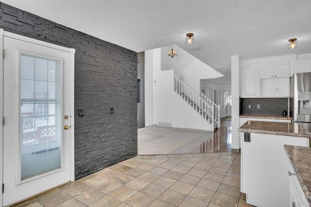 222 Douglas Ridge Circle Se, House detached with 3 bedrooms, 3 bathrooms and 4 parking in Calgary AB | Image 12
