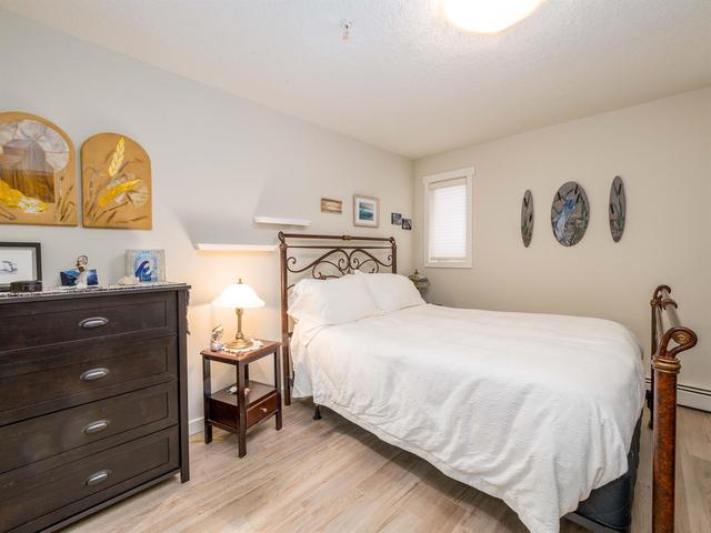 124 - 7229 Sierra Morena Boulevard Sw, Condo with 2 bedrooms, 2 bathrooms and 1 parking in Calgary AB | Image 20