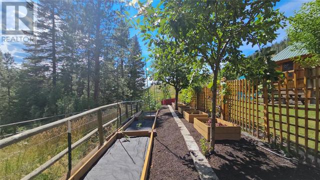 6741 Highway 33, E, House detached with 4 bedrooms, 2 bathrooms and 12 parking in Kelowna BC | Image 56