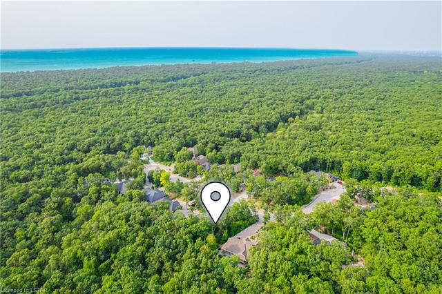 .554 acre wooded lot, steps from Pinery Park and nestled within the Oak Savannah forest setting | Image 23