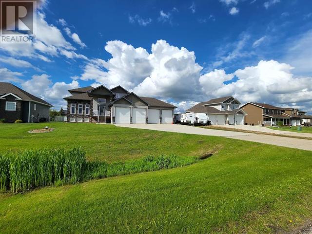 7710 Oxford Road, House detached with 4 bedrooms, 3 bathrooms and 5 parking in Grande Prairie County No. 1 AB | Image 2