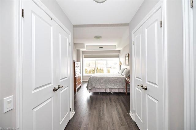 Living room entrance to second bedroom with handy pocket doors | Image 5