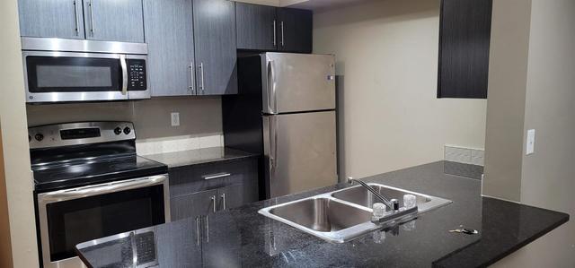 114 - 5 Saddlestone Way Ne, Condo with 2 bedrooms, 1 bathrooms and 1 parking in Calgary AB | Card Image
