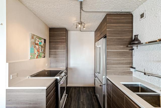 2911 - 221 6 Avenue Se, Condo with 2 bedrooms, 1 bathrooms and 1 parking in Calgary AB | Image 14