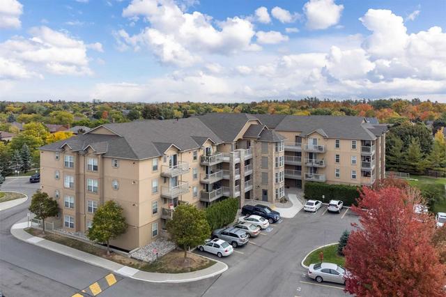 406 - 1440 Bishops Gate, Condo with 1 bedrooms, 1 bathrooms and 1 parking in Oakville ON | Card Image