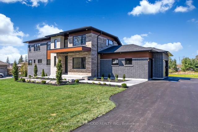 42 Park Lane, House detached with 4 bedrooms, 5 bathrooms and 9 parking in Clarington ON | Image 1