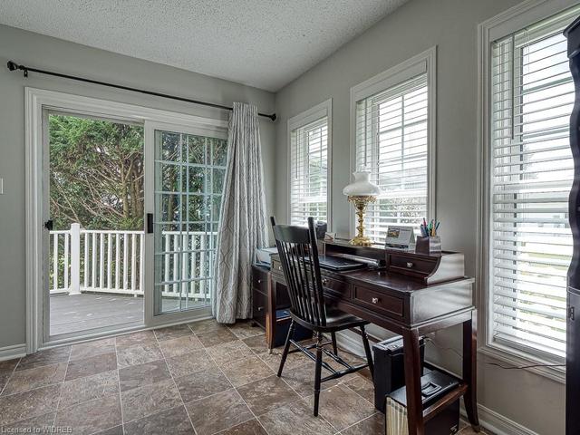 view from the Den and door on the right is the powder room. | Image 9