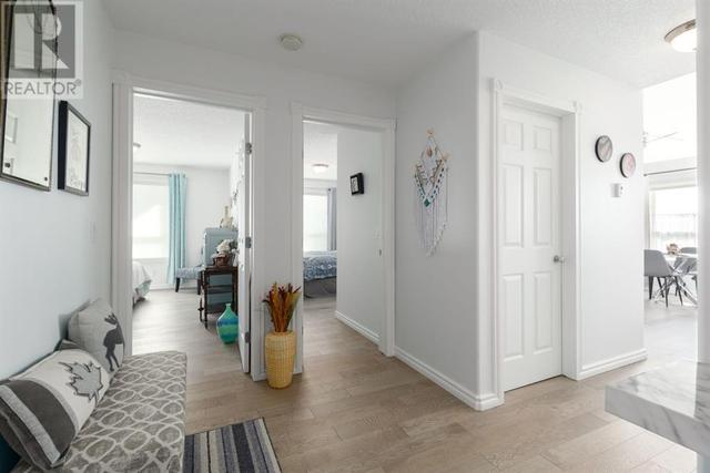408, - 128 Centre Avenue, Condo with 2 bedrooms, 2 bathrooms and 1 parking in Cochrane AB | Image 4