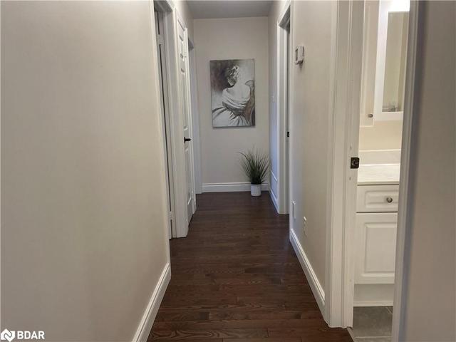 Down the hall to 3 Bedrooms on upper level | Image 49