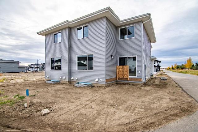 50 Earl Close, Home with 3 bedrooms, 2 bathrooms and 4 parking in Red Deer County AB | Image 30