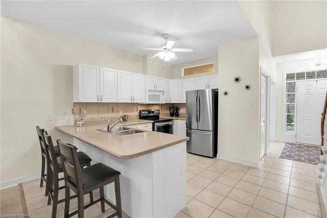 Lower level with kitchenette, great for anyone who loves to cook and needs a second oven | Image 15