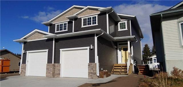 628 6 Ave Sw, House semidetached with 3 bedrooms, 3 bathrooms and 1 parking in Sundre AB | Image 1