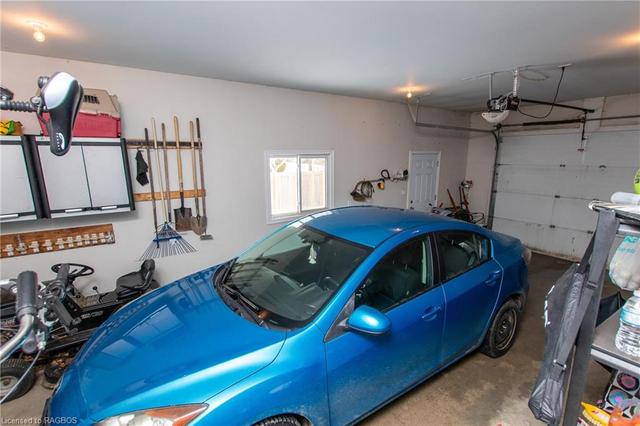 Garage has lots of space for cars, bikes & more | Image 35