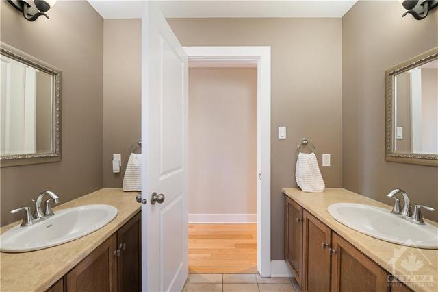Main 2nd level bathroom with 2 sinks and separate water closet/tub room | Image 21