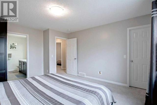 101 Mount Rae Heights, House detached with 3 bedrooms, 3 bathrooms and 4 parking in Okotoks AB | Image 23