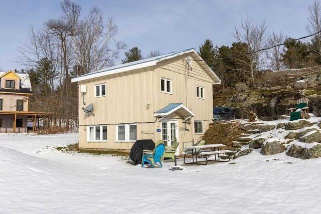 1142 Parker's Pt, House detached with 3 bedrooms, 3 bathrooms and 8 parking in Gravenhurst ON | Card Image