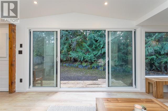 Oversized sliding doors allow for easy indoor and outdoor entertaining to your private deck | Image 8