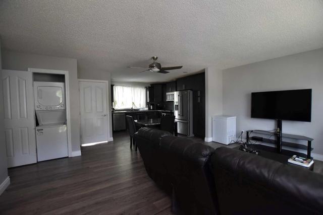 9311 106 Avenue, House detached with 5 bedrooms, 2 bathrooms and 5 parking in Grande Prairie AB | Image 3