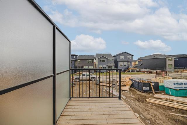 52 Edith Gate Nw, Home with 3 bedrooms, 2 bathrooms and 2 parking in Calgary AB | Image 41