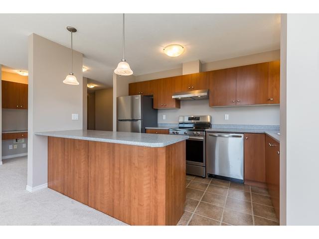 402 - 32063 Mt. Waddington Avenue, Condo with 2 bedrooms, 1 bathrooms and 1 parking in Abbotsford BC | Image 6