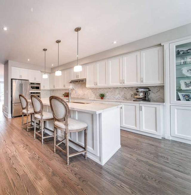 27a Marquette Ave, House semidetached with 4 bedrooms, 4 bathrooms and 2 parking in Toronto ON | Image 2