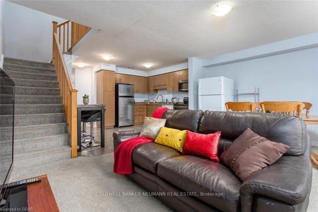 48 Waterford Dr, Townhouse with 4 bedrooms, 3 bathrooms and 2 parking in Guelph ON | Image 2
