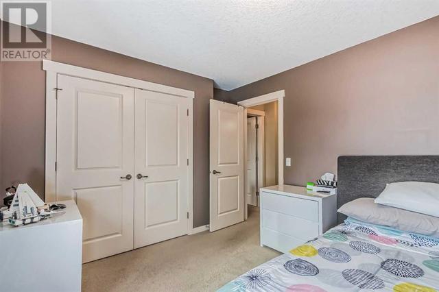 128 Mike Ralph Way Sw, House detached with 4 bedrooms, 3 bathrooms and 2 parking in Calgary AB | Image 36