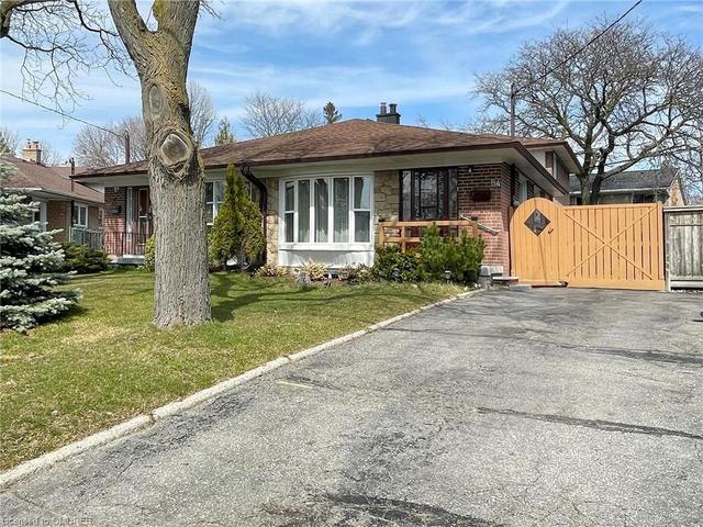 84 Marbury Crescent, House semidetached with 4 bedrooms, 2 bathrooms and 3 parking in Toronto ON | Image 1