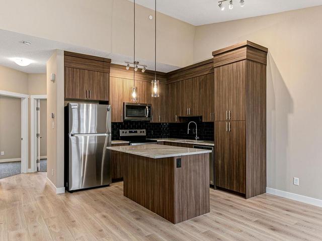 266 Livingston Common Ne, Home with 2 bedrooms, 1 bathrooms and 1 parking in Calgary AB | Image 2