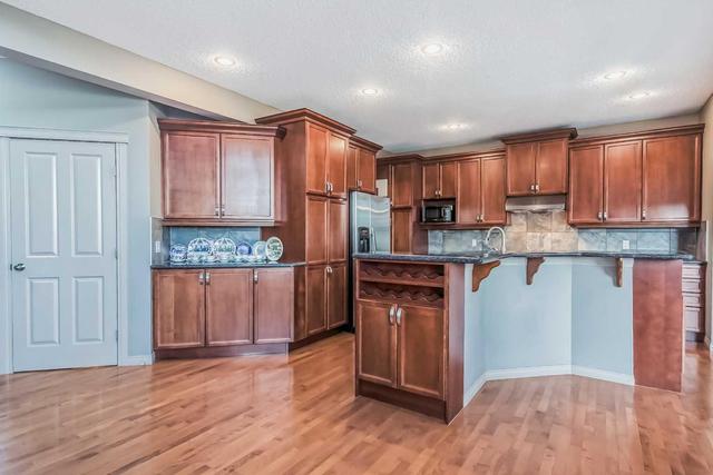 143 Sienna Park Heath Sw, House detached with 5 bedrooms, 3 bathrooms and 4 parking in Calgary AB | Image 5
