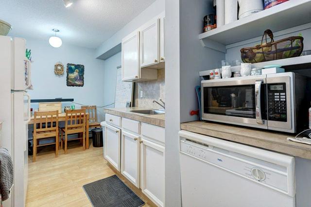 11 - 1703 11 Avenue Sw, Condo with 1 bedrooms, 1 bathrooms and 1 parking in Calgary AB | Image 1