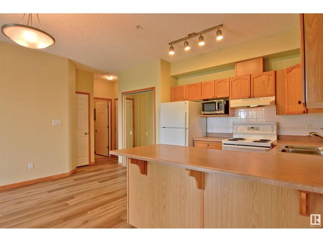 207 - 10118 95 St Nw, Condo with 2 bedrooms, 2 bathrooms and 1 parking in Edmonton AB | Image 5