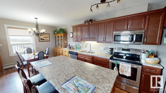 303 - 4002 47 St, Condo with 2 bedrooms, 2 bathrooms and null parking in Drayton Valley AB | Image 9