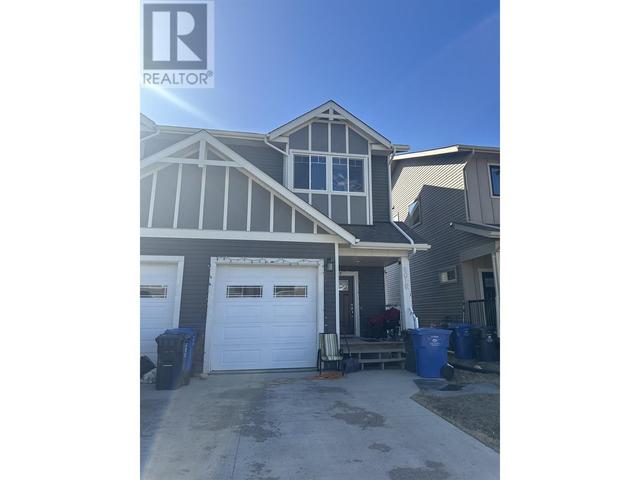 8618 74 Street, House attached with 4 bedrooms, 4 bathrooms and null parking in Fort St. John BC | Image 1
