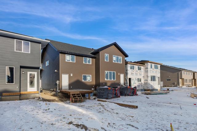 161 Ambleton Drive Nw, Home with 3 bedrooms, 2 bathrooms and 2 parking in Calgary AB | Image 6