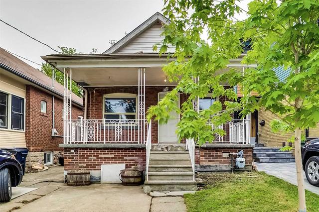 83 Clovelly Ave, House detached with 2 bedrooms, 2 bathrooms and 1 parking in Toronto ON | Image 1