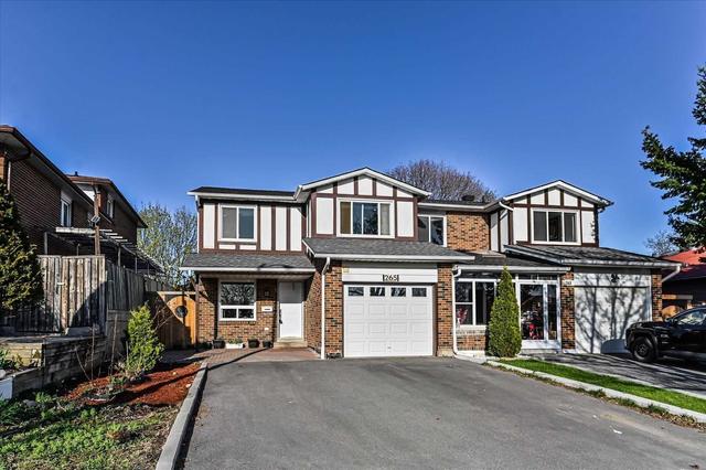 265 Cherokee Blvd, House semidetached with 4 bedrooms, 4 bathrooms and 5 parking in Toronto ON | Card Image
