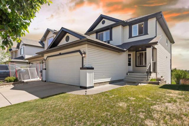 140 Tuscany Ravine Terrace Nw, House detached with 4 bedrooms, 3 bathrooms and 4 parking in Calgary AB | Image 2
