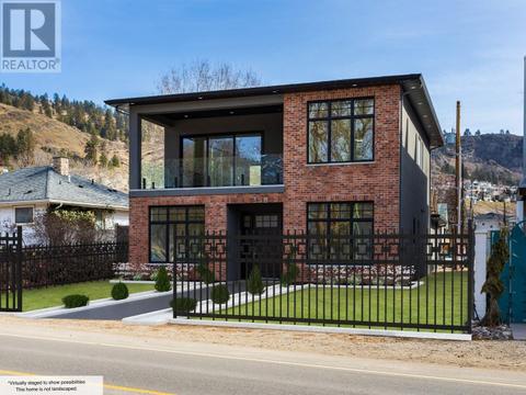 671 Ellis Street, House detached with 3 bedrooms, 3 bathrooms and 3 parking in Kelowna BC | Card Image