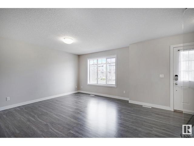 100 - 9535 217 St Nw, House attached with 3 bedrooms, 2 bathrooms and null parking in Edmonton AB | Image 7