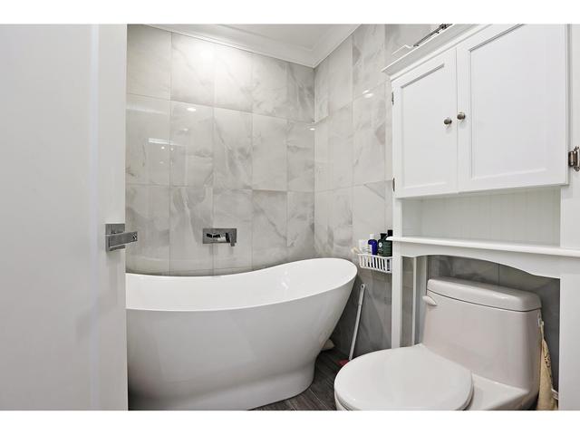 7739 157 Street, House detached with 6 bedrooms, 6 bathrooms and 4 parking in Surrey BC | Image 25