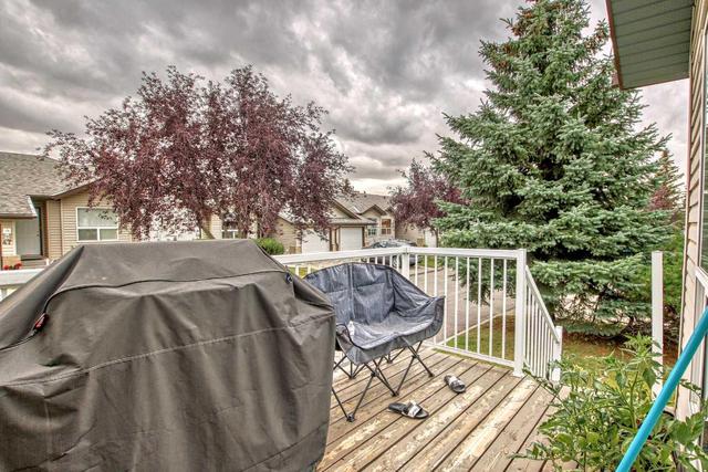 38 Tararidge Circle Ne, Home with 2 bedrooms, 2 bathrooms and 2 parking in Calgary AB | Image 16