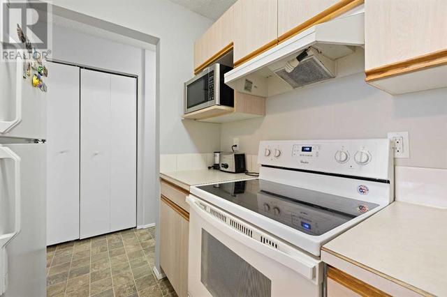 210, - 647 1 Avenue Ne, Condo with 2 bedrooms, 1 bathrooms and 1 parking in Calgary AB | Image 11