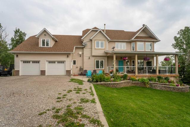 282042 128 Street W, House detached with 4 bedrooms, 3 bathrooms and 6 parking in Foothills County AB | Image 2