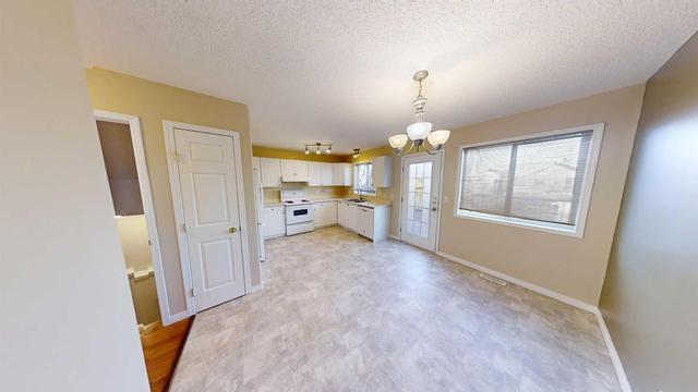 6301 90 Street, Home with 4 bedrooms, 1 bathrooms and null parking in Grande Prairie AB | Image 6