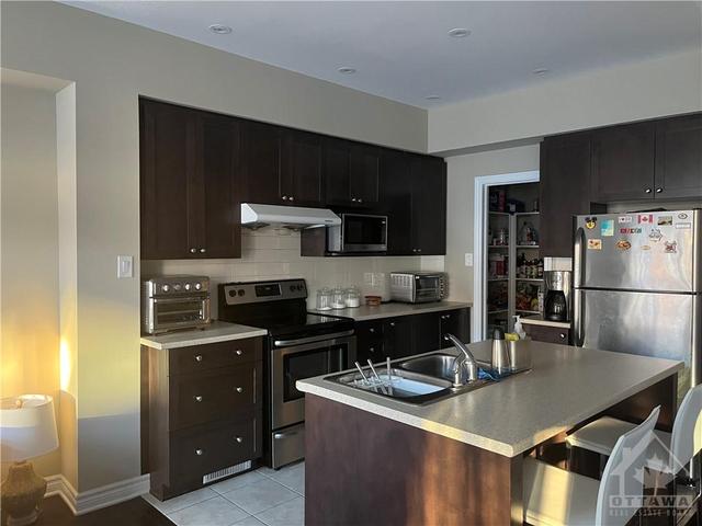 871 Fletcher Circle, Townhouse with 3 bedrooms, 3 bathrooms and 3 parking in Ottawa ON | Image 6